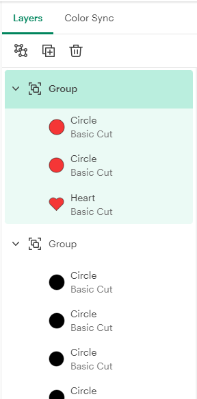 The layers pane showing a group with the heart and registration marks and a second group with all of the dots in it.