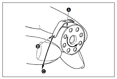 textiles_lockstitch_bobbin_into_bobbin_case.png