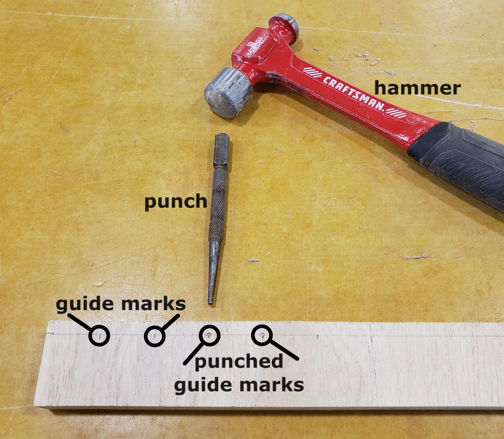 wood_shop_drill_press_marked_and_punched.png